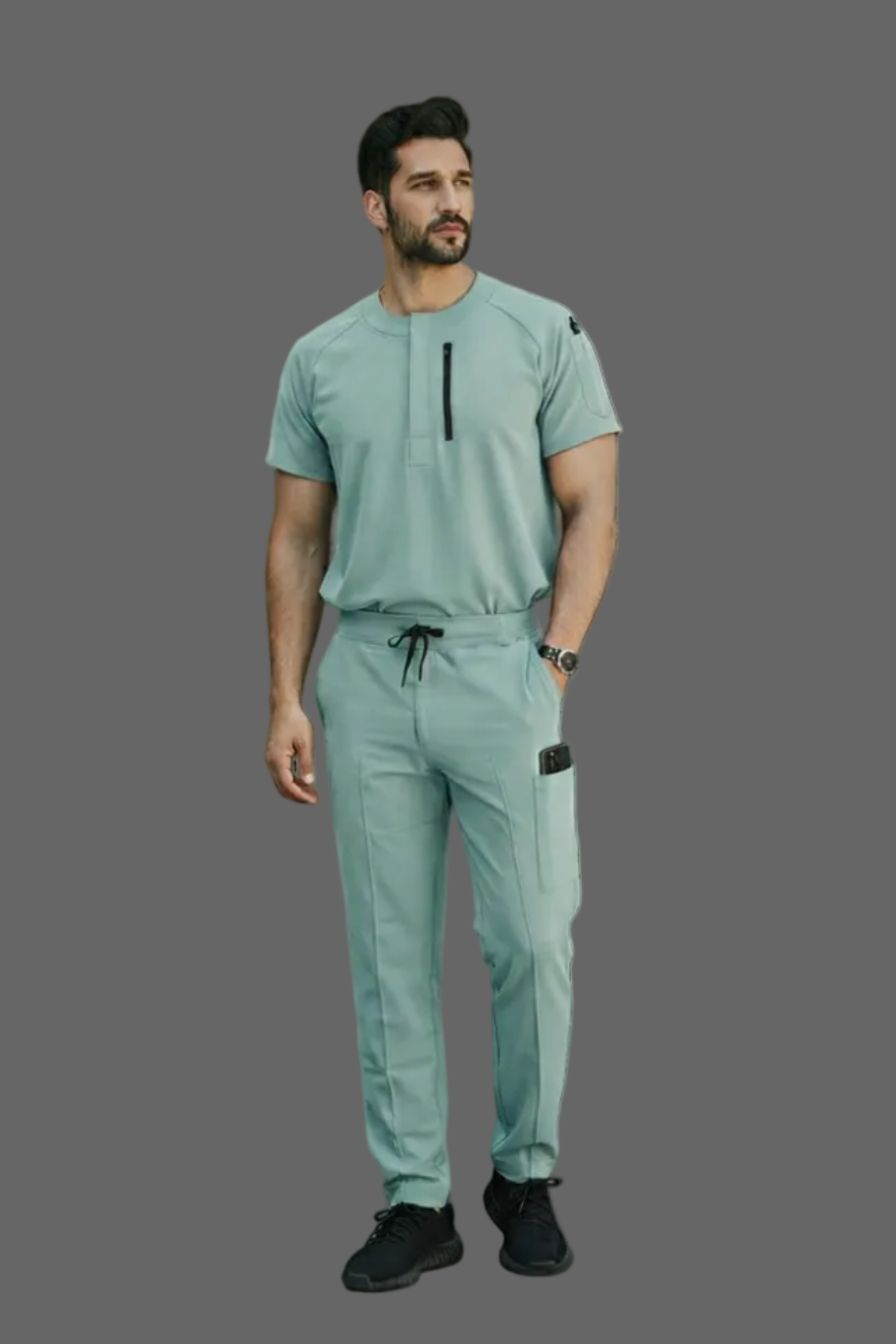 Man wearing a light green outfit on a white background