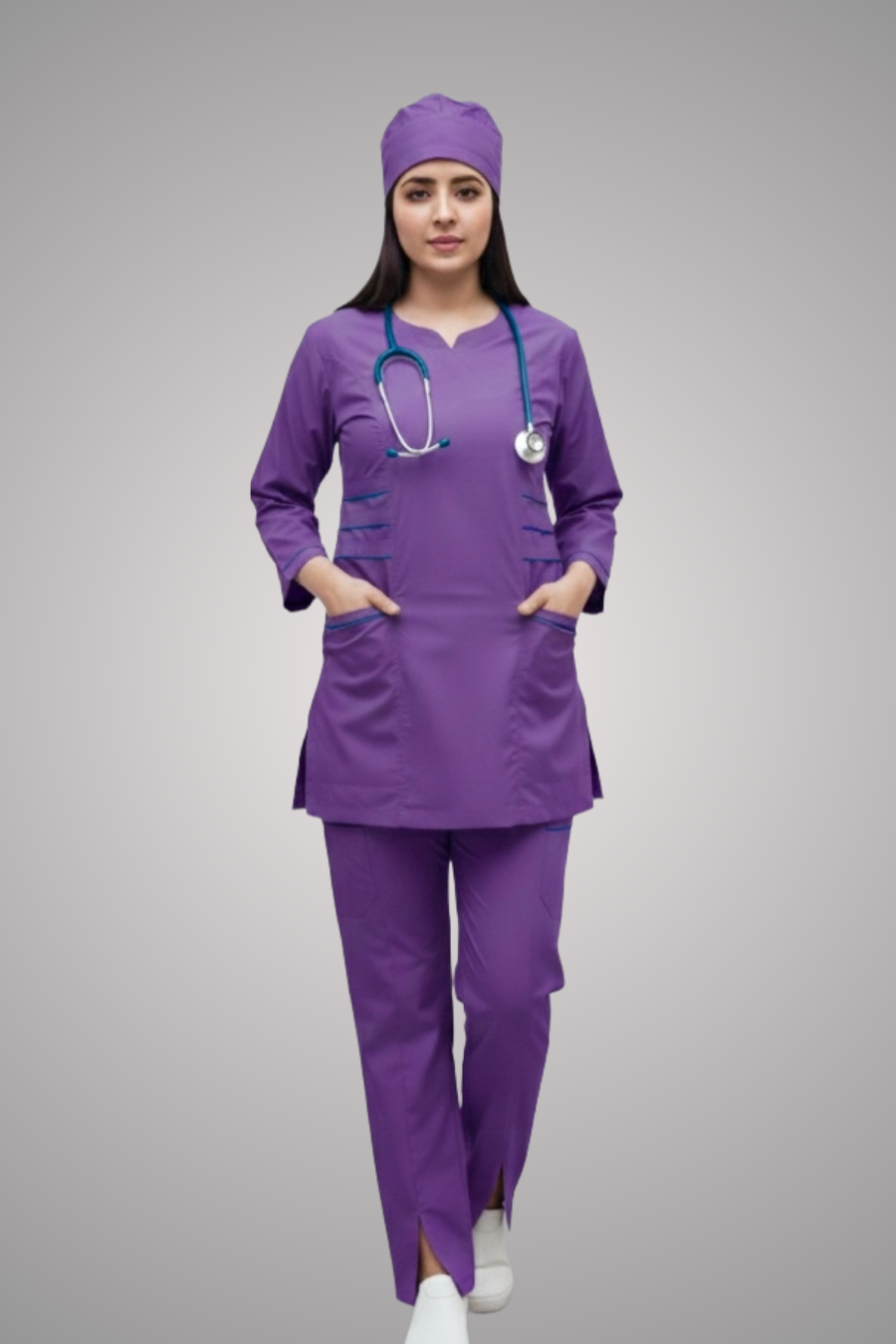 Person wearing a purple medical scrub set with a stethoscope on a gray background